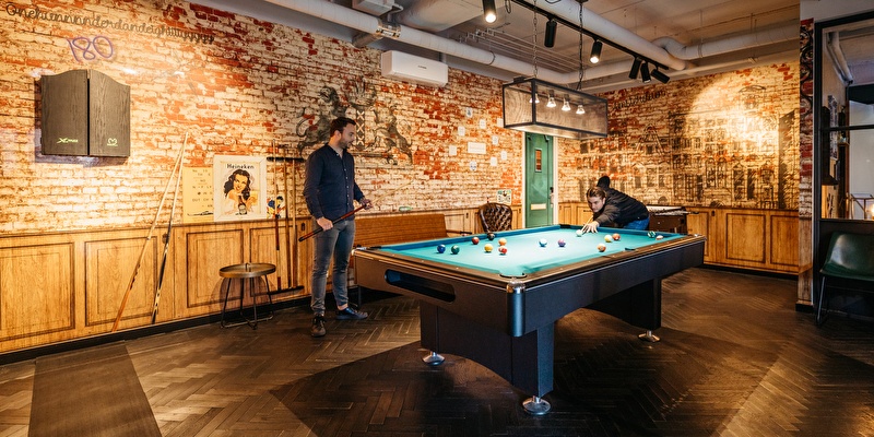 Pool table, darts board and football table in our playroom