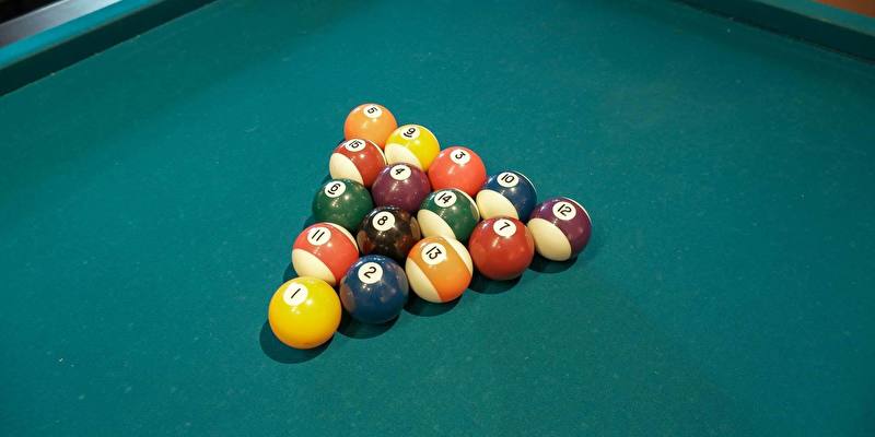 Pool table, darts board and football table in our playroom